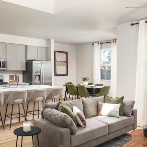 a living room with a couch and a table